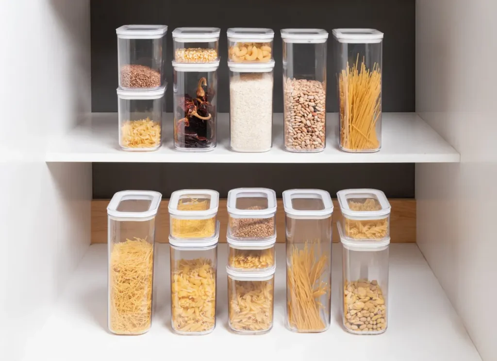 Image of a clean, well-organized pantry with sealed food containers to prevent pests